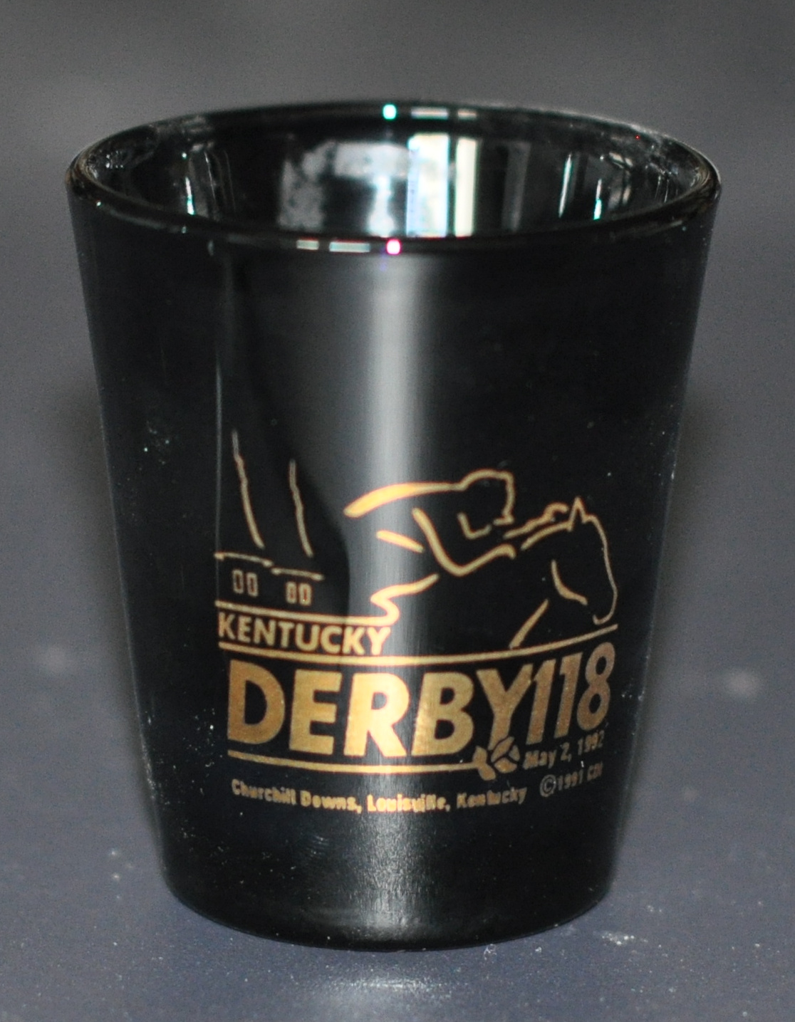 the FRONT of the glass